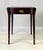 This finely crafted Pembroke drop-leaf table by Henkel Harris features a classic Federal-style design constructed from...