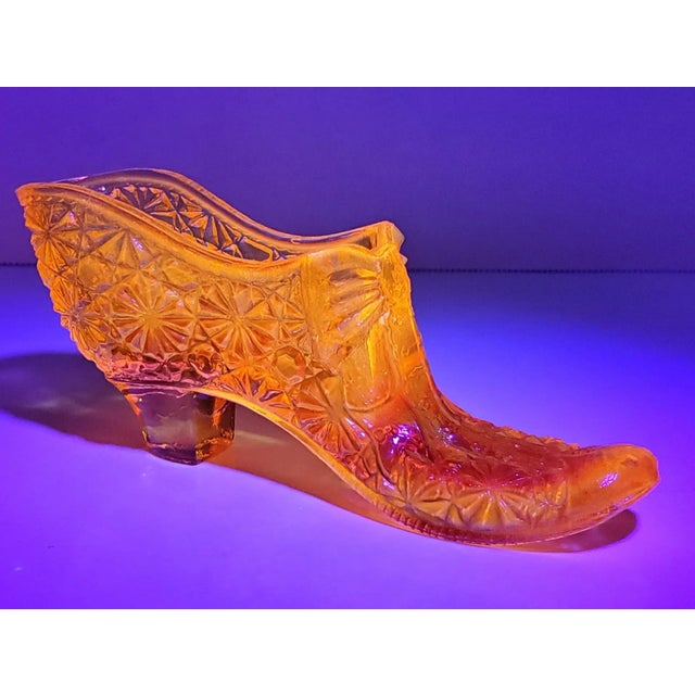Pattern: Daisy And Button w/ Bow Color: Amber Gold Manufacturer: Boyd Glass Company Date Produced: 1970s Shape: Slipper...