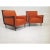 Modern mid century style lounge chairs. The set of chairs are newly upholstered and refinished. The chairs are done in a...