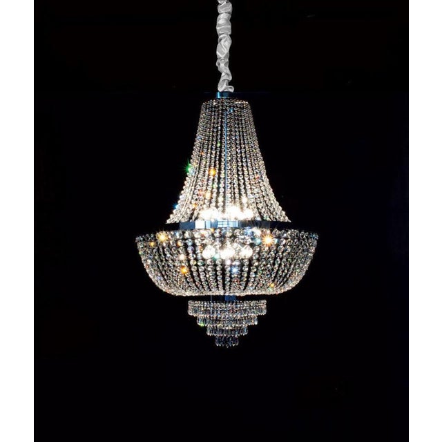Allure 12 lights chandelier in polished chrome and crystal by aggiolight. Dimensions: d 80 x h 114 cm. Materials: polished...