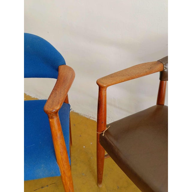 This pair of armchairs attributed to designer Kurt Olsen represents a refined example of 1960s Scandinavian design, where...