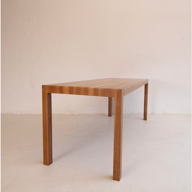 Rectangular mid-century coffee table in Bauhaus style. Probably 1960s. Walnut veneered. Without marking. Puristic, linear...