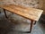 Antique French farmhouse table originating from the Auvergne region, dating from around 1900. This solid and characterful...