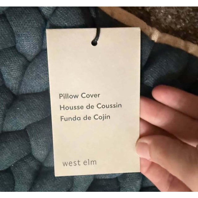 Stylish West Elm pillow cover. Has chunky braided texture in a beautiful teal color. Made with Better Cotton and OEKO-TEX...
