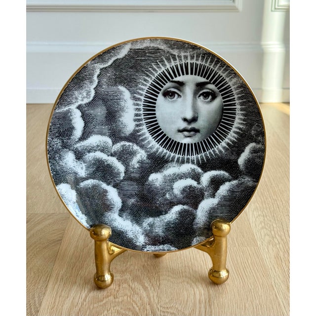 Piero Fornasetti iconic "Motiv 18" porcelain plate. Produced in collaboration with the renowned German porcelain house...