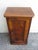 Antique French burl walnut nightstand, c.1900 Having a rectangular top below which is a paneled cupboard door and standing...