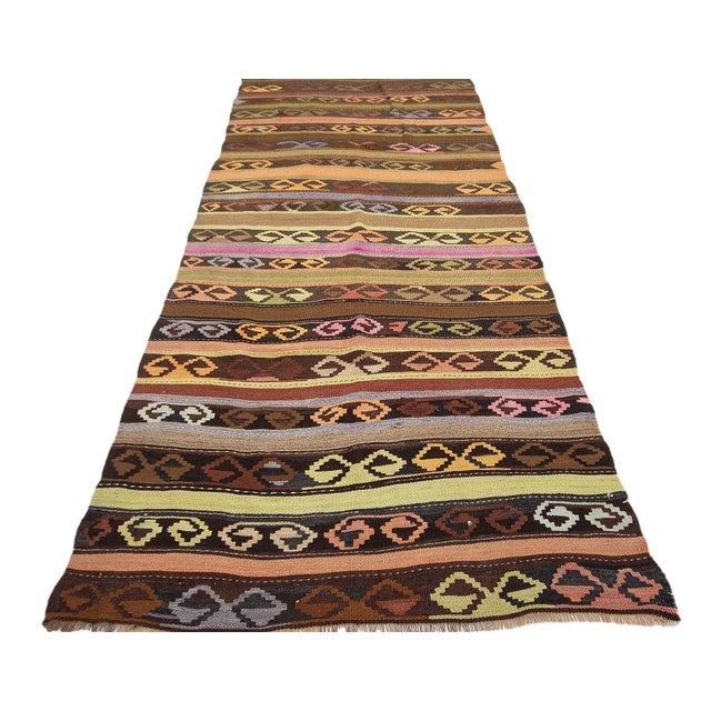Vintage handwoven kilim rug from Kars region of Turkey. Approximately 55-65 years old. In very good condition.