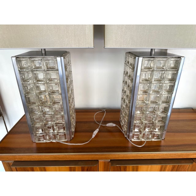 Rare tall Mid-Century Modern Space Age pair of pressed glass cube table or bedside lamps by the Italian design manufacture...