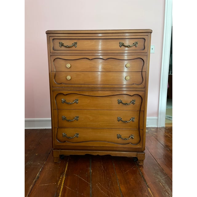 Available for purchase is a rare, family heirloom, beautifully preserved 4-piece French Provincial bedroom suite...