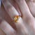 14K Yellow Gold 8 x 12 mm Natural Citrine｜Yellow｜Pear｜Eye Clean Amethyst CTW: 2.60 This East-West ring centers on a...