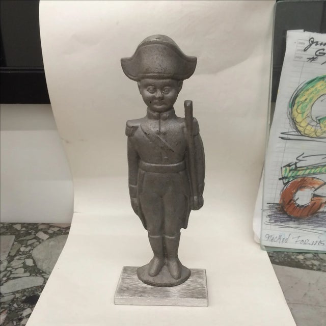 Aluminum soldier figure on base. May have been a mold for fabrication.