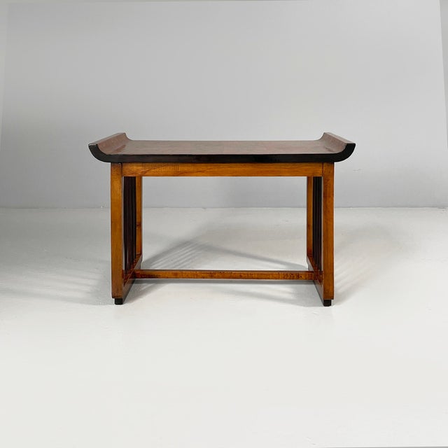 Italian Art Deco coffe table in wood and black wood, 1930s Coffee table made entirely of wood. The rectangular top is...