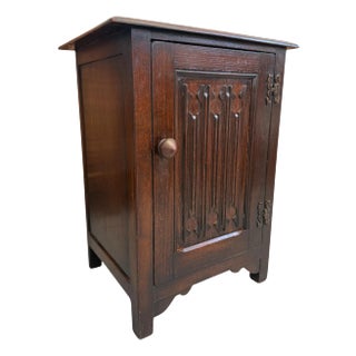 1970s Vintage Uk Imported Accent Table or Side Cabinet With Welsh Influences Carved Possibly Oak Door With Drop Hinges Dark Stained Wood For Sale