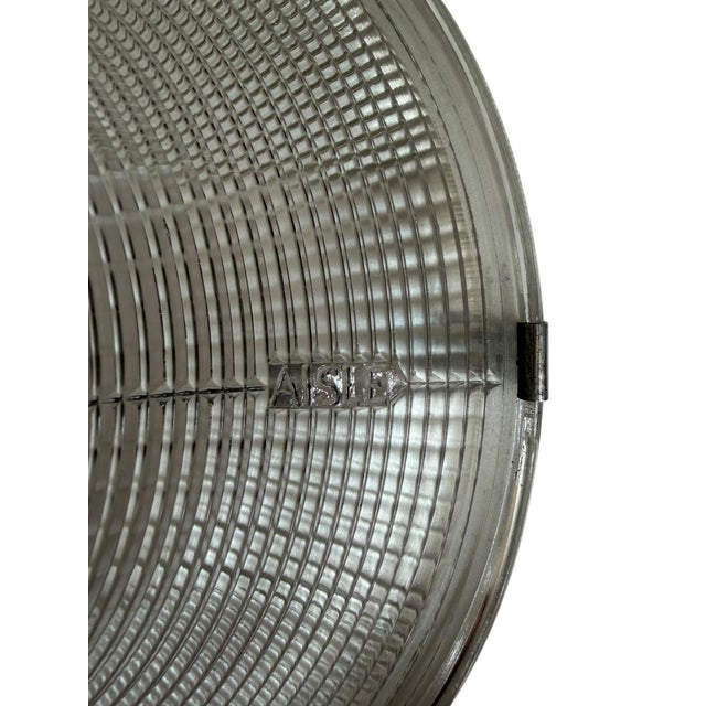 Rare Antique Holophane ceiling light fixture with “AISLE” imprint. This light has a shade with prismatic and ribbed glass...