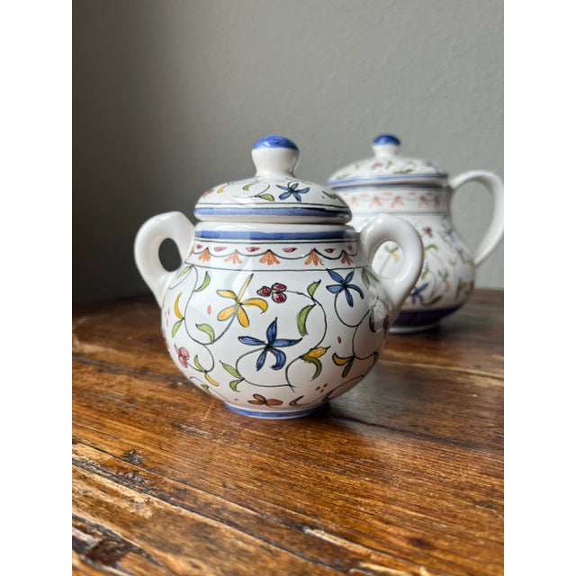 Lis Ceramica Made in Brasil Teapot, Sugar and Creamer set Beautifully hand-painted floral design Teapot is 8.5” length,...
