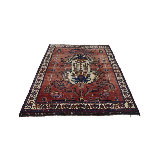 Decorative antique wool Persian rug. Approximately 75-85 years old. In very good condition.