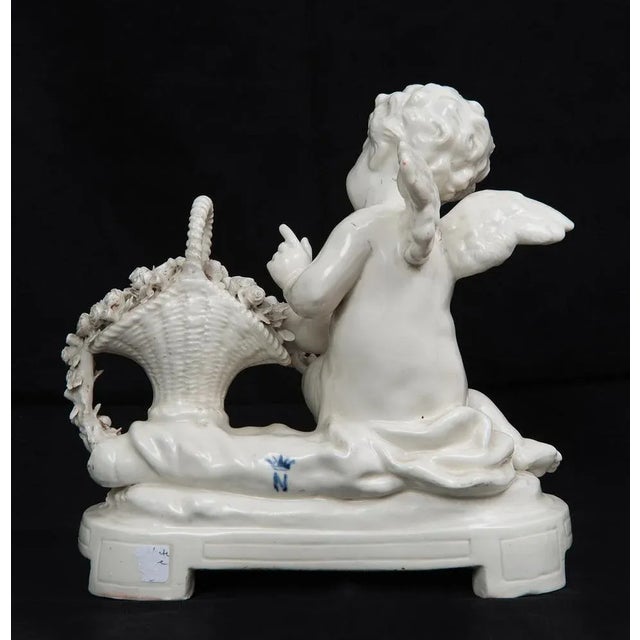 Porcelain Sculpture Depicting Putto with Basket of Flowers from Capodimonte, 20th Century For Sale - Image 4 of 7