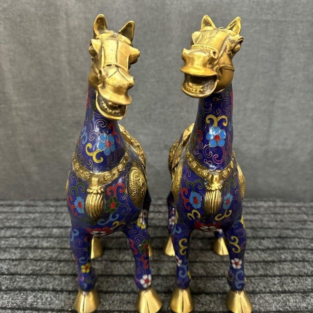 Bring a regal and majestic presence to your interior with this impressive pair of vintage cloisonné enamel war horses....