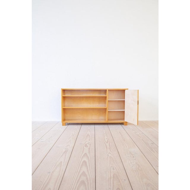 The small sideboard / bookcase was made in Sweden in the 1930s. Over the years, it has acquired a lovely color and a fine...