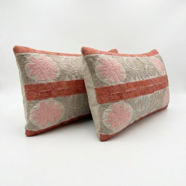 This beautiful 13'' x 24'' & 15'' x 24'' hand-embroidered Suzani pillow cover set was made from authentic Uzbek cotton...