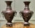 A Pair of Large Japanese Bronze Vases, Meiji Period. These large bronze vases have flared rims at the top with a raised...