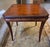 Exceptional vintage game table, featuring a striking gold-tooled leather playing surface. Combining classic sophistication...
