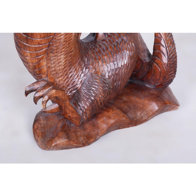This impressive dragon sculpture dates back to the first half of the 20th century and carries fascinating Asian roots that...