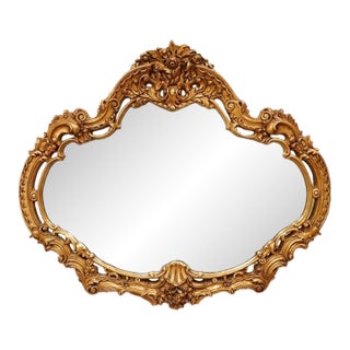 Mid 20th Century Louis XV Style Gilt Wall Mirror With Rococo Carved Floral Frame For Sale