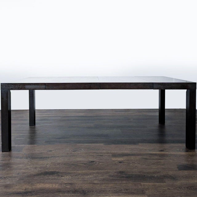 Parsons style table with 2 leaves. Brand: West Elm. Dimensions (in): 38W x 38D x 30H.