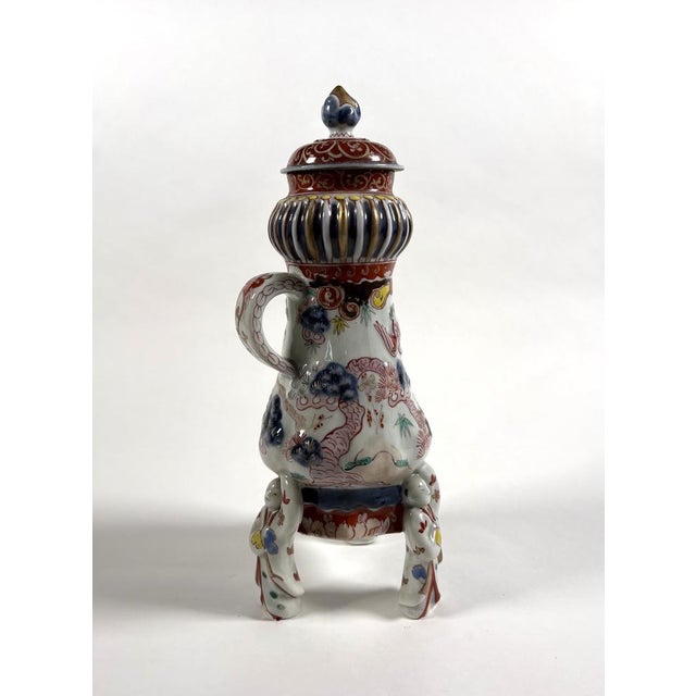 Imari Porcelain Tripod Fountain, Japan, Edo Period (1603-1868) 17th-18th Century Porcelain fountain with Imari relief...