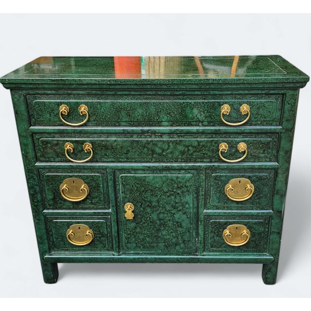 This Vintage Henredon Furniture Green Lacquered Faux Tortoiseshell Chinoiserie Cabinet has dynamic elements that make it...