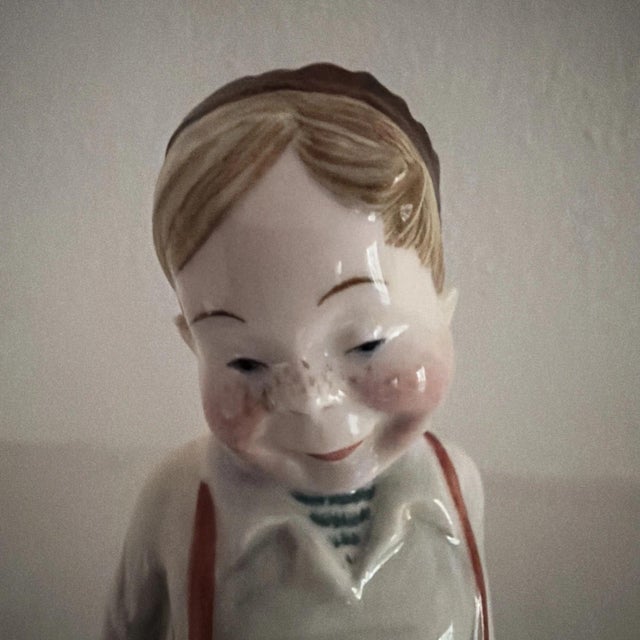 The Vintage Small Boy & Dog Figurine “Butch” by Gort is a charming and nostalgic decorative collectible that captures the...