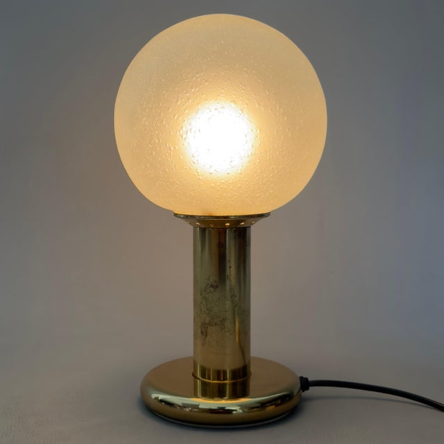 A refined italian-designed diffused-light table lamp, original and labeled by targetti sankey spa. subject and style:...