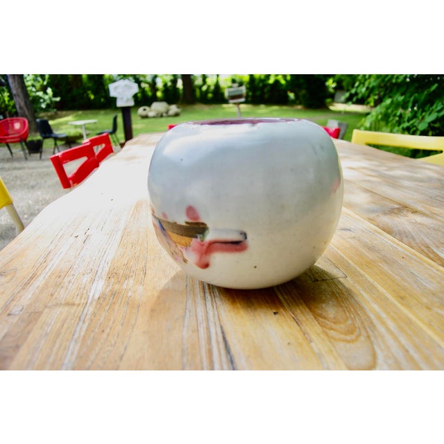 Rare spherical vase with a melting snow glaze, which took the artist eight years to perfect in an electric kiln. Thick,...