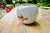 Rare spherical vase with a melting snow glaze, which took the artist eight years to perfect in an electric kiln. Thick,...