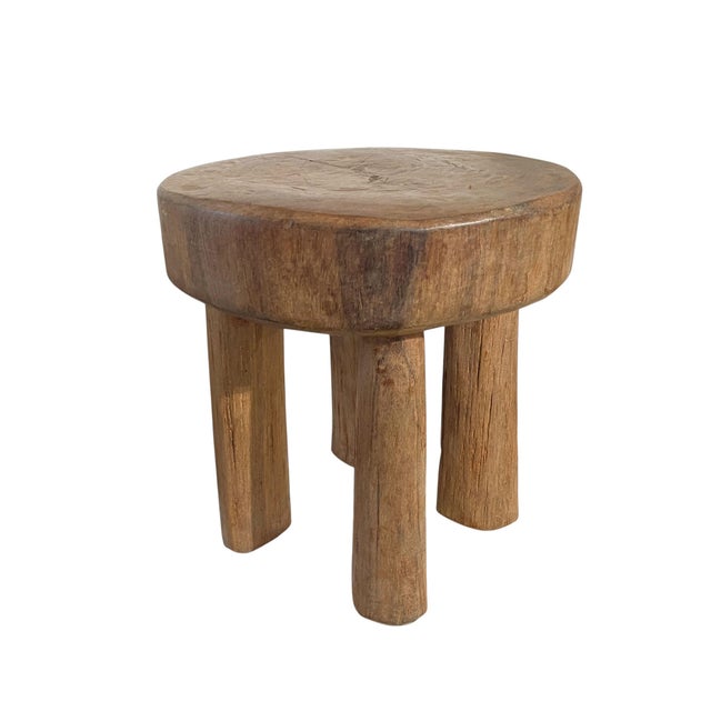 This remarkable vintage African milk stool is hand carved form one piece of wood by the Hehe Gogo people of Tanzania....