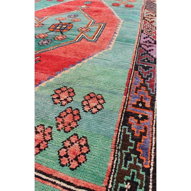 Mid 20th Century Brightly Colored Rug Turkish Vintage With Medallion and Geometric Flowers For Sale - Image 5 of 8