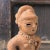 This expressive terracotta figure is crafted in the style of traditional Haniwa statues from Japan's Kofun period....