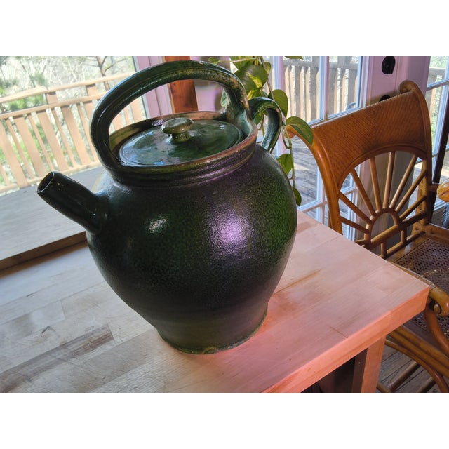 This is a large beautiful French Provence green glazed jug traditionally used to keep liquids cool. It was purchased in...