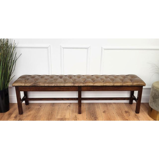 Beautiful piece in solid Italian walnut wood, highlighted by the upholstered leather using beautiful handmade button-...