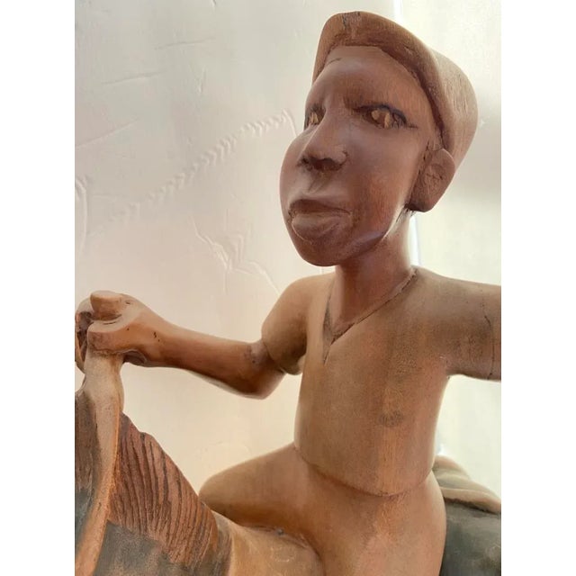 Folk Art Colonial Man & Horse Carved Wood Very detail Both are in neutral hues of colors Has hairline in base Does not...
