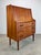 A teak secretary desk/chest made in Denmark and sold by retailer Maurice Villency, circa 1960’s. Attributed to designer...