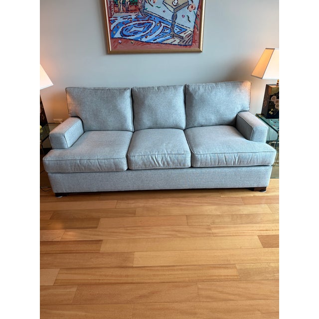 Comfortable sofa in a blue ash basketweave fabric by Pottery Barn. Easy neutral piece and in great condition. 86”W x 38”D...