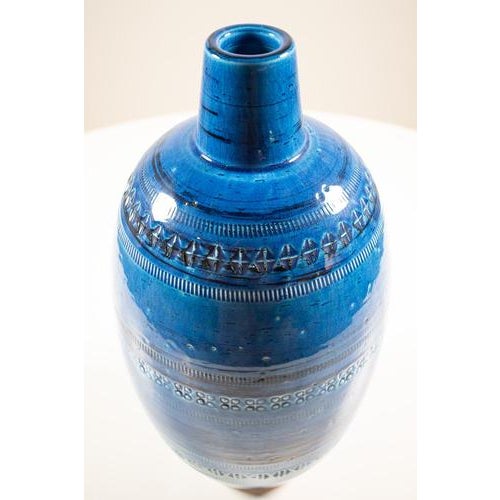 Bitossi uovo vase (rimini blu 999-196) from italy. A beautiful big vase in blue colours and with carved decorations. It is...