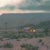 Phone Home by Mark Harrison | Oil on canvas Landscape with mountains and a distant house at dusk For Sale - Image 4 of 5