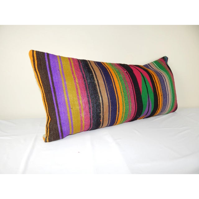 These beautiful 20"x40" pillow covers were made from an authentic, vintage Turkish rug handwoven in the 1960s. Bright...