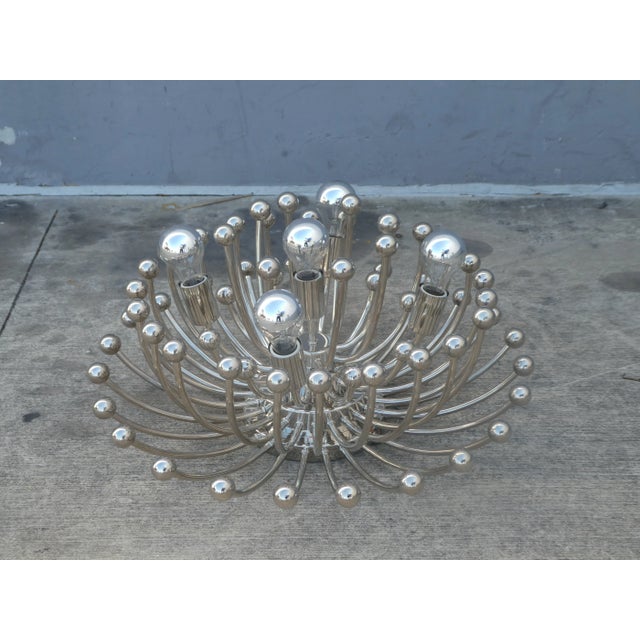 Studio Tetrarch Pistillo Chandelier sold as found in vintage condition without damage.