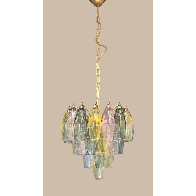 DUTIES FREE Murano glass chandelier with 32 multicolored poliedri elements. Gold and brass frame, authentic Venetian...
