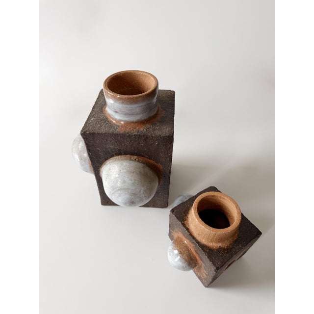 Large one of a kind handmade cubist stoneware vessel with cover. Measures 13” tall by 4.5" by 7". Gorgeous, heavy and in...