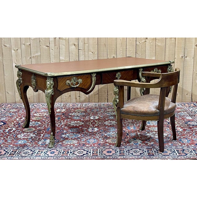 Desk and its armchair, Regency style, Napoleon III period late 19th century in amaranth, rosewood and oak - desk: L=1m81,...